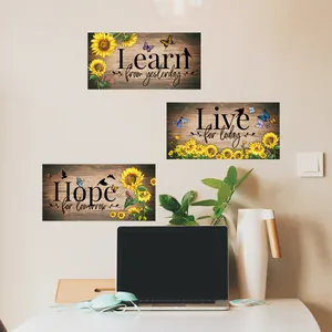 Three-piece sunflower wall art set with inspirational quotes on rustic wood background