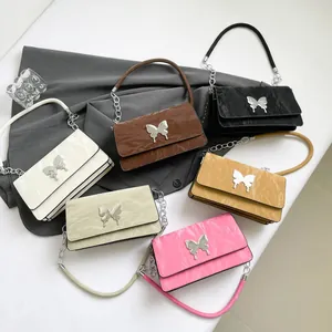Chic bow-knot underarm bags in multiple colors with metallic chains and glossy finish