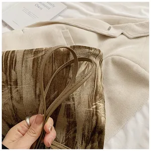 Close-up of retro brown marbled tote bag texture with slim faux leather strap