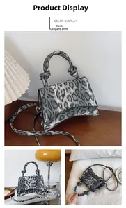 Detailed view of the leopard print handbag featuring a unique curved base and knotted handle
