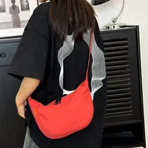Stylish red half-moon nylon crossbody bag for women with high-capacity minimalist design