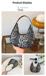 Détails du sac demi-lune imprimé léopard gris avec fermeture éclair dorée élégante