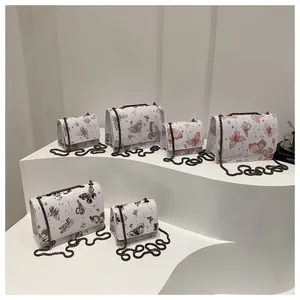 Détails des sacs à bandoulière imprimé papillon en plusieurs tailles et coloris
