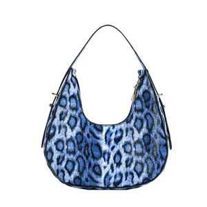 Sac hobo chic à imprimé léopard bleu et noir avec anse élégante en cuir noir
