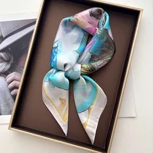 Detail of silk scarf with abstract oil painting floral pattern in luxury gift box