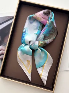 Detailed macro of floral art silk scarf with blue and pink abstract oil painting texture