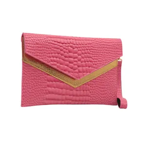 Fashionable rose pink crocodile pattern envelope clutch bag with gold trim and wristlet