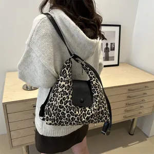 Large capacity leopard print tote bag with black leather flap for daily commuting