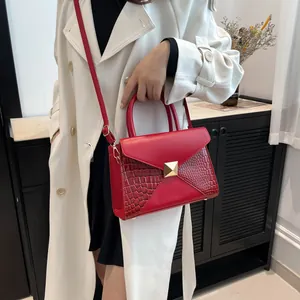 Fashion red crocodile pattern handbag with envelope flap and gold square stud detail