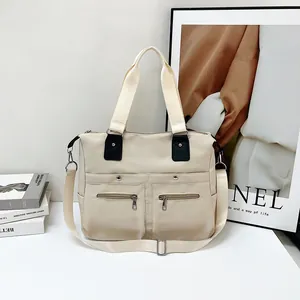 Beige oxford stoffen crossbodytas met grote capaciteit en verstelbare riem voor reizen