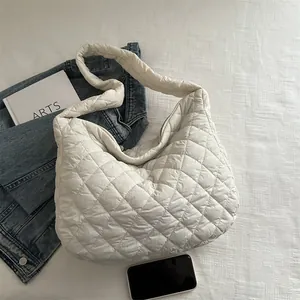 Minimalist white quilted puffer shoulder bag with large capacity and soft rhombus texture