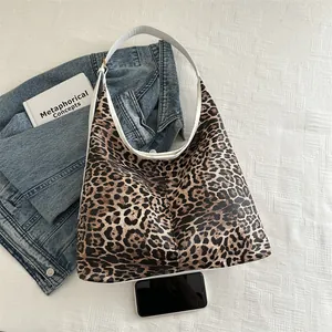 Contrast leopard print hobo bag with white leather straps and large capacity styling
