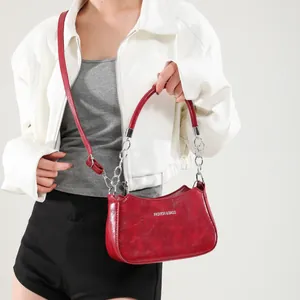 Dark red crescent moon shoulder bag with vintage texture and silver chain strap
