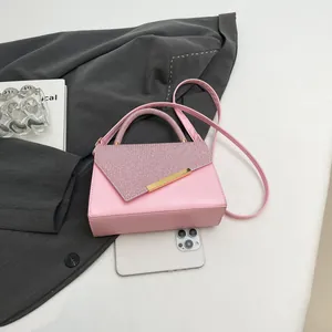 Pink rhinestone crossbody bag with irregular flap and gold trim for women fashion
