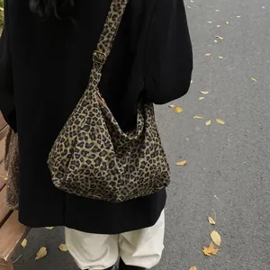 Chic large leopard print crescent tote bag with adjustable wide shoulder strap for women