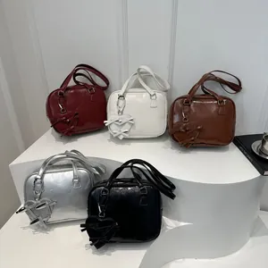 Retro aesthetic glossy PU leather shoulder bags in five colors with heart charms