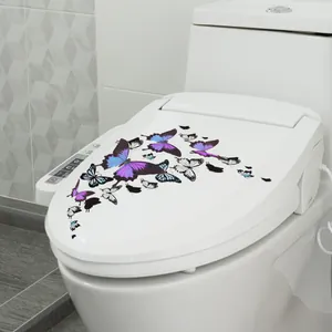 Détail des stickers de papillons colorés pour décoration de couvercle de toilette