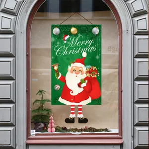Close-up of a festive Merry Christmas hanging flag featuring a cartoon Santa Claus