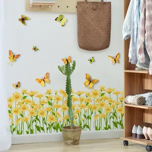 Detail of yellow flower wall stickers with 3D butterflies and decorative home elements