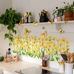 Detailed view of 3D yellow butterfly stickers and sunflower decals on kitchen wall