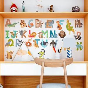 Detail of 26 alphabet animal wall decals for kids room in a warm nursery setting