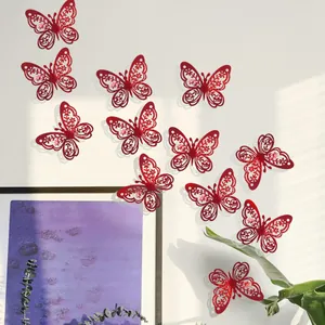 Detail der roten Glitzer-Schmetterling-Wandaufkleber mit aufwendigen lasergeschnittenen Mustern