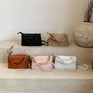 Chic embossed floral crossbody bags in five colors with top handles and gold hardware