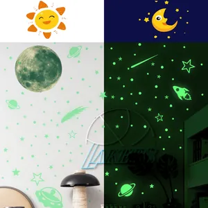 Luminous wall decals set showing glow-in-the-dark moon and planets in day and night contrast