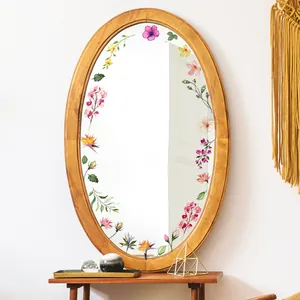 Stickers miroir floraux avec hibiscus et oiseau de paradis sur un cadre de miroir ovale