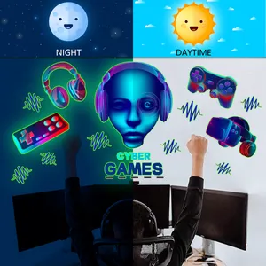 Autocollants muraux gaming lumineux montrant les effets de lueur jour et nuit