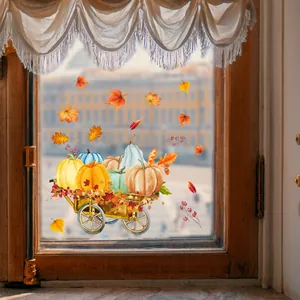 Detailed harvest display of pumpkin cart and autumn maple leaves window decal