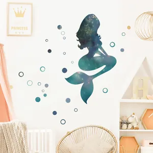 Detail of starry mermaid silhouette wall stickers with bubbles in a kids room decor