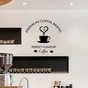 Detail of coffee cup wall decal featuring heart steam and premium bean text design
