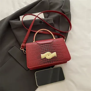 Red crocodile embossed leather small square bag with gold metal handle and shoulder strap