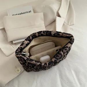 Quilted leopard print pouch clutch bag with silver zipper closure for women