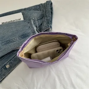 Fashionable purple satin butterfly embroidered pouch with metal zipper and ample storage
