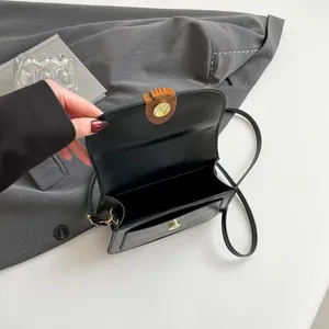 Vintage black oil leather saddle bag with gold magnetic buckle for women