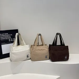 Sacs cabas minimalistes en velours côtelé avec broderie lapin en crème, kaki et marron