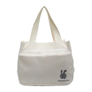 Sac fourre-tout en velours côtelé blanc avec broderie lapin et grande capacité