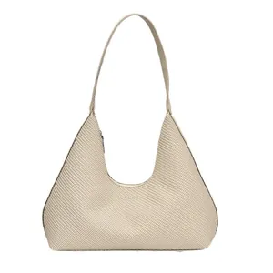 Beige woven hobo bag with structured shoulder strap and elegant crescent shape