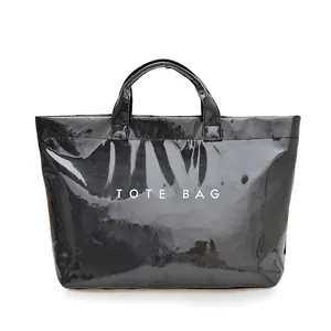 Borsa tote nera lucida in PVC con scritta bianca TOTE BAG per pendolari e uso quotidiano