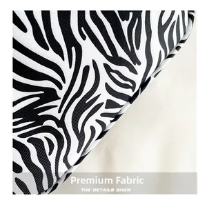 Close-up of zebra pattern fabric showing high-quality woven texture on shoulder bag