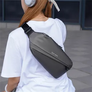 Rear view of a dark grey waterproof chest bag with Sport Male print on a person
