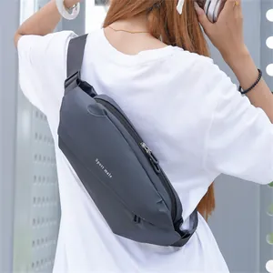 Detail of dark grey waterproof crossbody bag featuring Sport Male print and wide strap