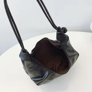 Retro black large capacity hobo bag with knotted shoulder strap and soft PU leather