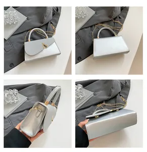 Detailed views of a silver rhinestone handbag with V-shaped buckle and metal chain strap