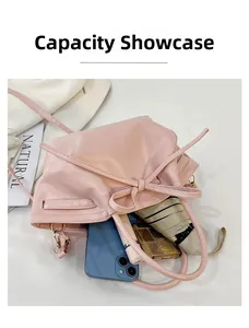Top view of pink ribbon bucket bag showing large capacity for phone and cosmetics