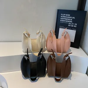 Minimalist faux leather hobo bags in four colors with adjustable straps and zip closure