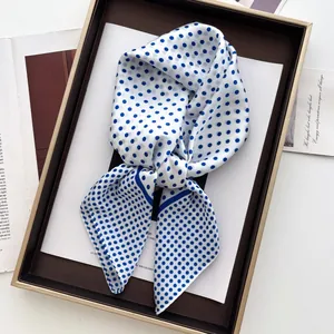 Elegant silk-like white square scarf with navy polka dots in a premium gift box set
