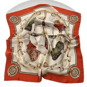 Silk-like satin square scarf with classic equestrian patterns in orange and cream
